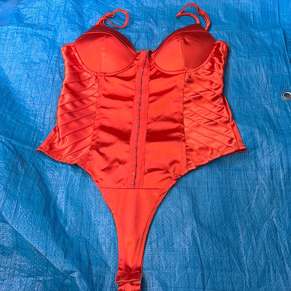 Orange body suit